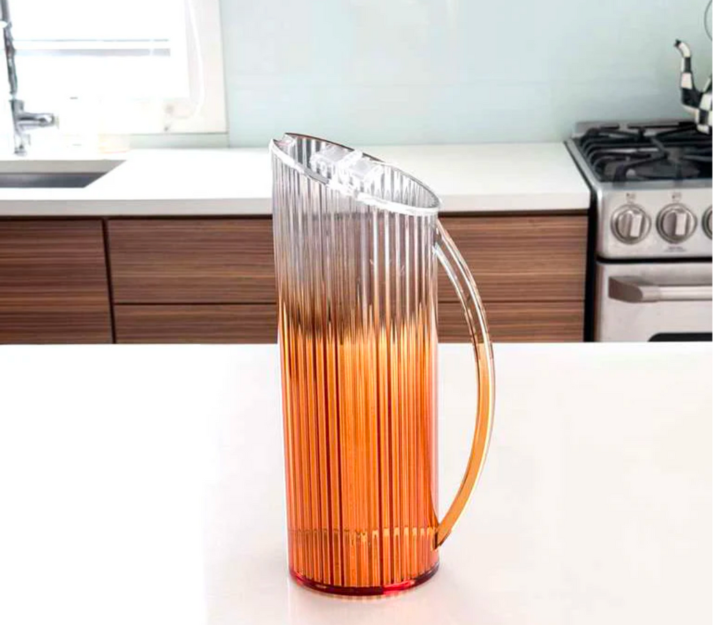 Amber ribbed lucite pitcher