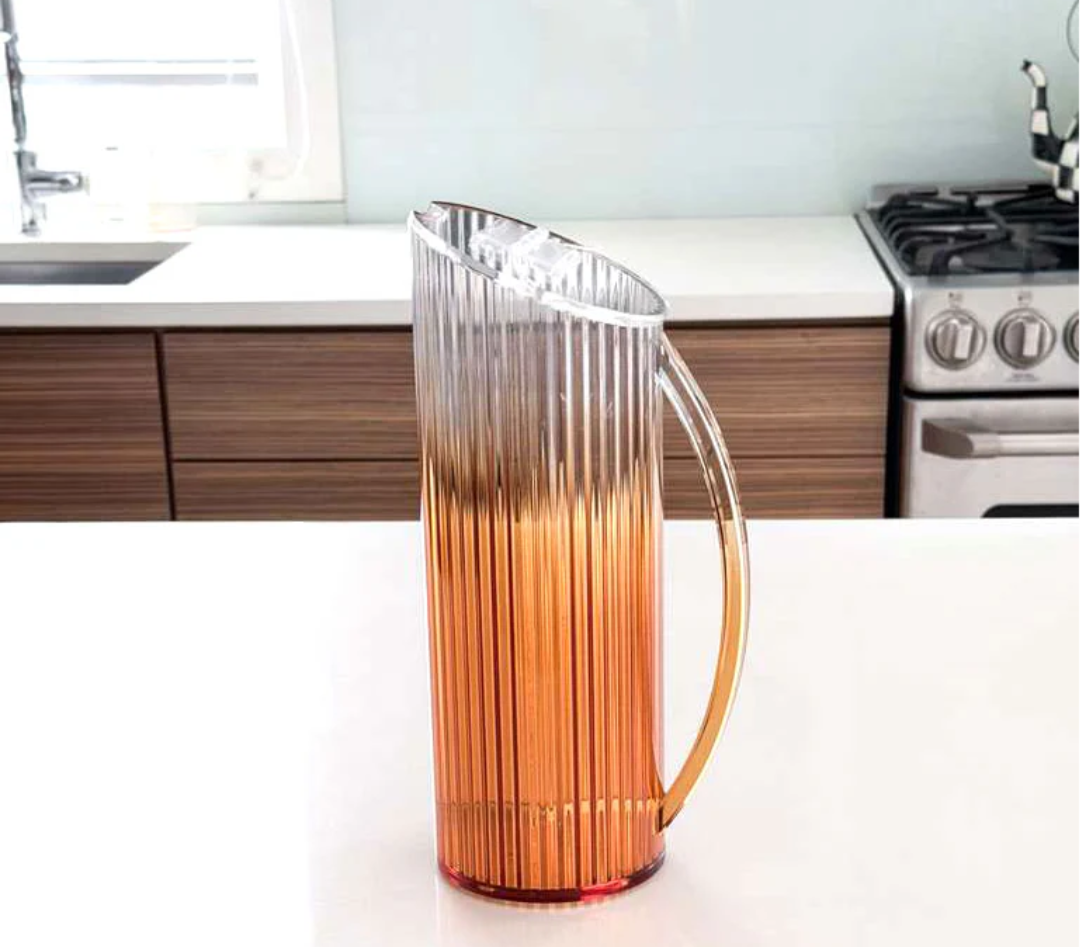 Amber ribbed lucite pitcher